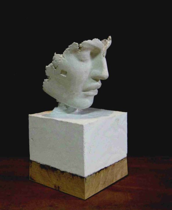 concrete sculpture of face